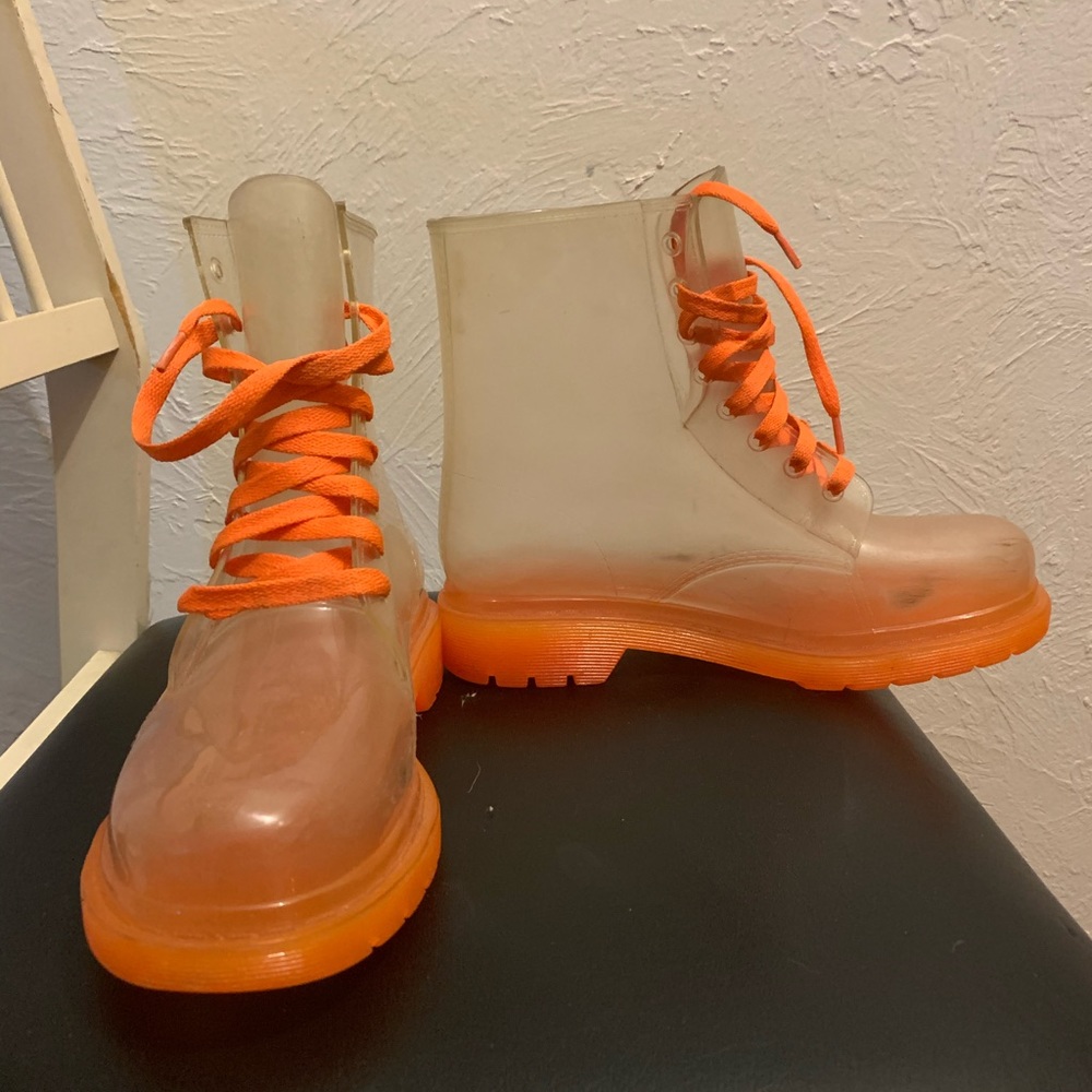 Clear neon orange boots